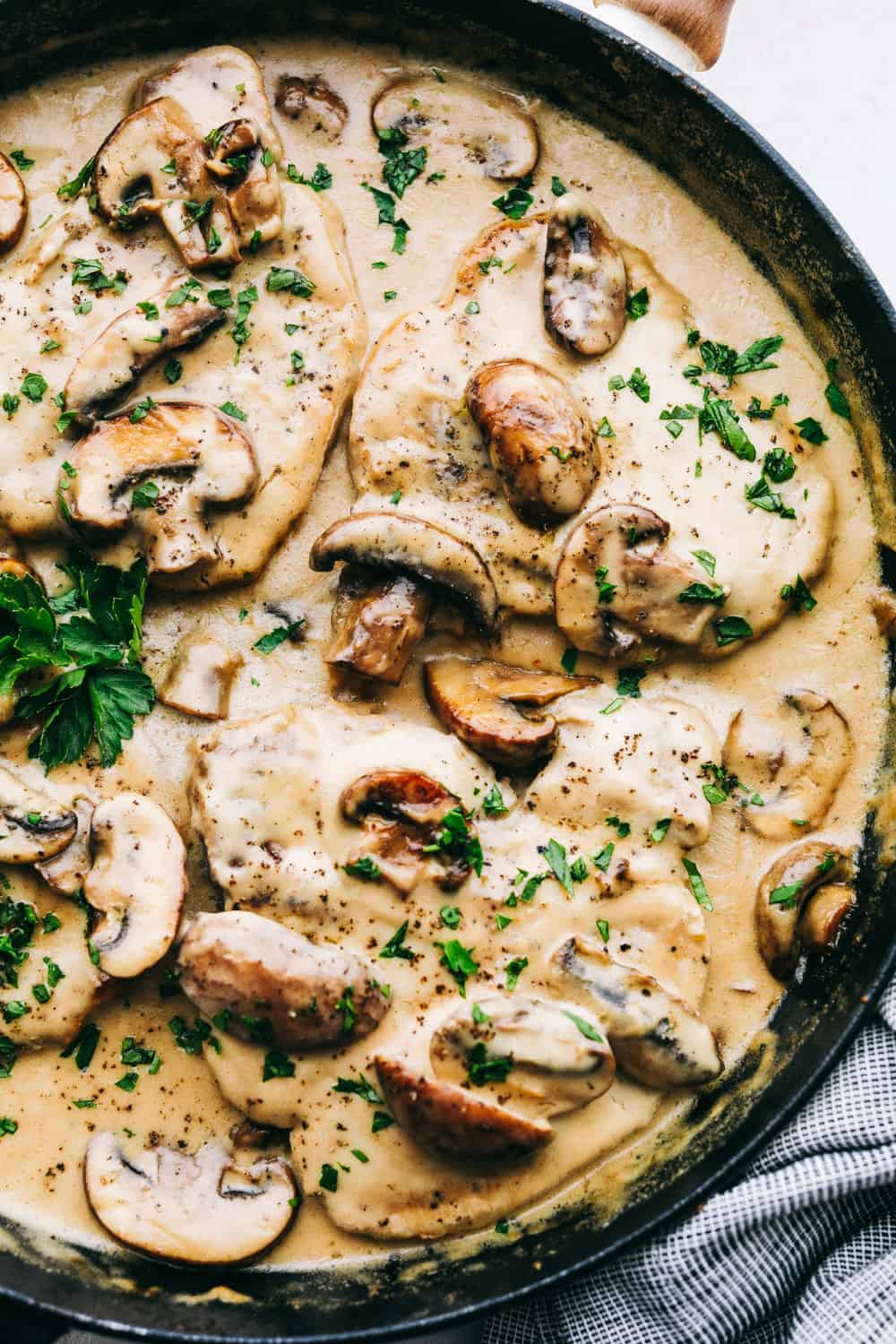 Smothered Pork Chops in an Amazing Mushroom Gravy