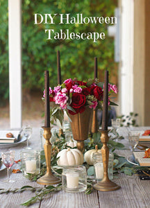 a Halloween tablescape with a mystery book theme