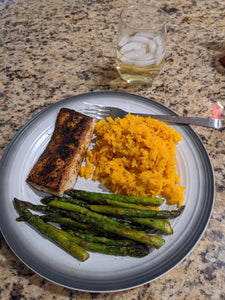 Blackened Mahi Sauteed asparagus and yellow rice with Chardonnay