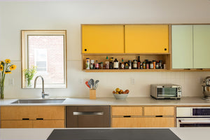 The Color-Coded Cabinets in This Kitchen Makes Organizing a Breeze