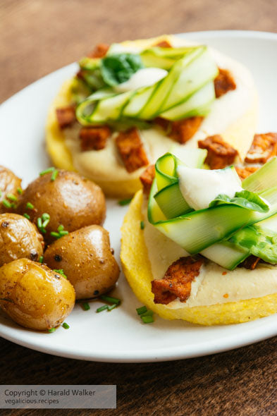 Spicy Tofu Pieces and Shaved Asparagus on Polenta with a Vegan Cheese Sauce